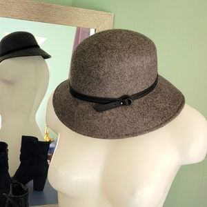 Grey wool cloche hat.